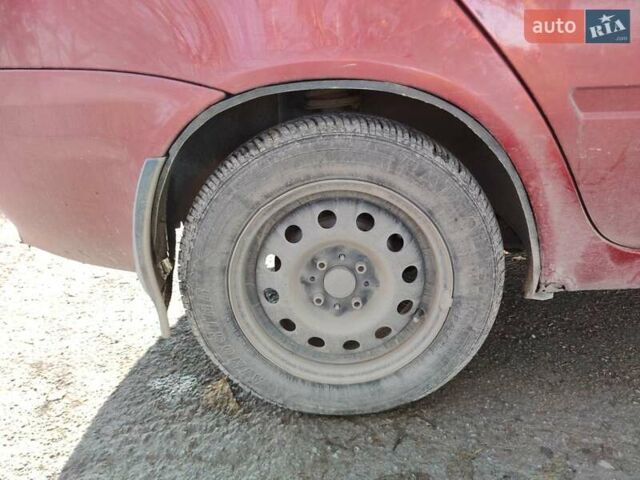 Красный ВАЗ 1117 Калина, объемом двигателя 1.4 л и пробегом 196 тыс. км за 1250 $, фото 3 на Automoto.ua