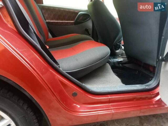 Красный ВАЗ 1117 Калина, объемом двигателя 1.6 л и пробегом 94 тыс. км за 2800 $, фото 9 на Automoto.ua