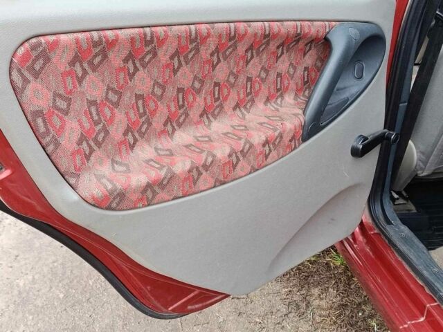 Красный ВАЗ 1117 Калина, объемом двигателя 1.6 л и пробегом 190 тыс. км за 2150 $, фото 7 на Automoto.ua