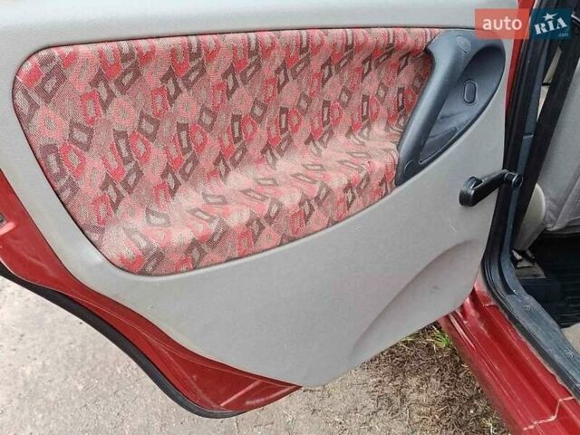 Красный ВАЗ 1117 Калина, объемом двигателя 1.6 л и пробегом 190 тыс. км за 2150 $, фото 6 на Automoto.ua