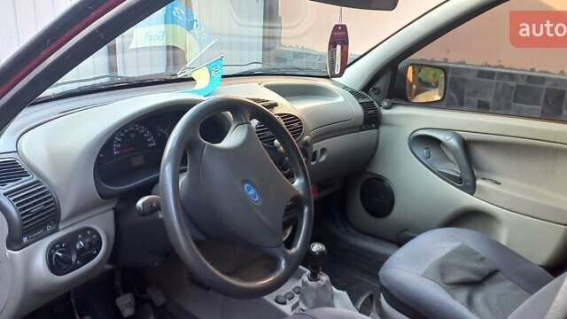 Красный ВАЗ 1117 Калина, объемом двигателя 1.4 л и пробегом 120 тыс. км за 3000 $, фото 3 на Automoto.ua