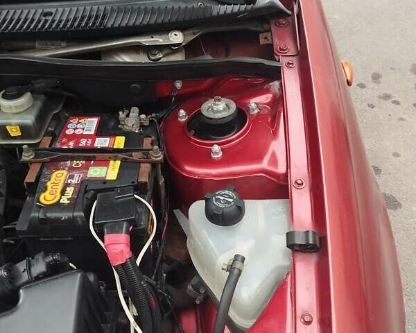 Красный ВАЗ 1117 Калина, объемом двигателя 1.39 л и пробегом 205 тыс. км за 2700 $, фото 14 на Automoto.ua