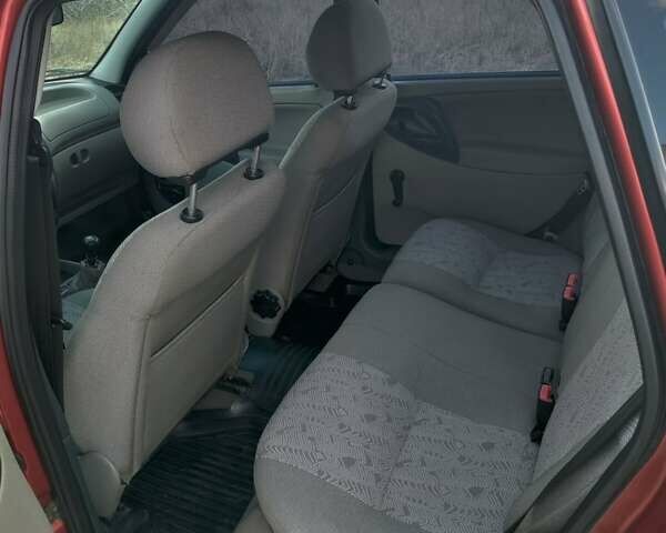 Красный ВАЗ 1117 Калина, объемом двигателя 1.4 л и пробегом 88 тыс. км за 3600 $, фото 12 на Automoto.ua