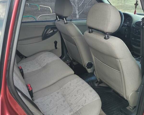 Красный ВАЗ 1117 Калина, объемом двигателя 1.4 л и пробегом 88 тыс. км за 3600 $, фото 9 на Automoto.ua