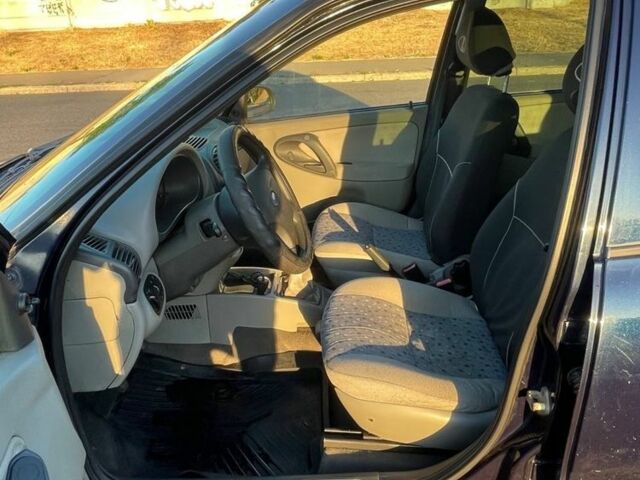 Синий ВАЗ 1117 Калина, объемом двигателя 1.5 л и пробегом 136 тыс. км за 2000 $, фото 2 на Automoto.ua