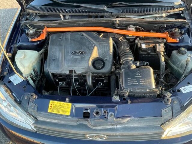 Синий ВАЗ 1117 Калина, объемом двигателя 1.5 л и пробегом 136 тыс. км за 2000 $, фото 3 на Automoto.ua