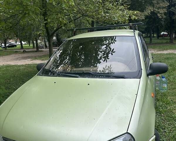 Зелений ВАЗ 1117 Калина, об'ємом двигуна 1.6 л та пробігом 330 тис. км за 1377 $, фото 2 на Automoto.ua