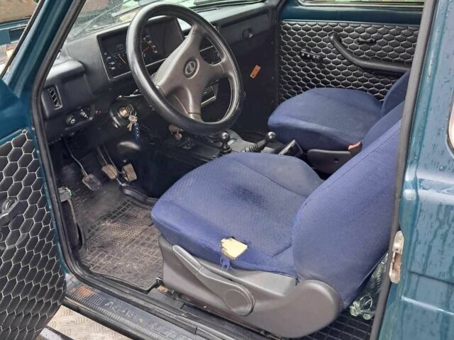 Зеленый ВАЗ 1117 Калина, объемом двигателя 1.7 л и пробегом 134 тыс. км за 4300 $, фото 12 на Automoto.ua