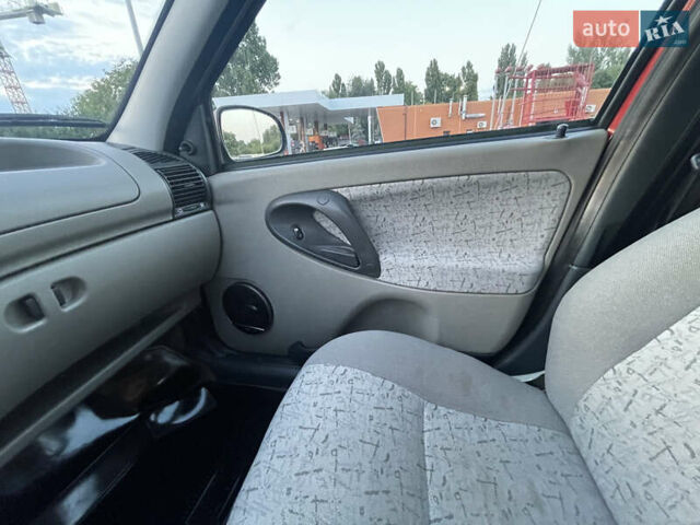 Красный ВАЗ 1119 Калина, объемом двигателя 1.6 л и пробегом 30 тыс. км за 2800 $, фото 10 на Automoto.ua