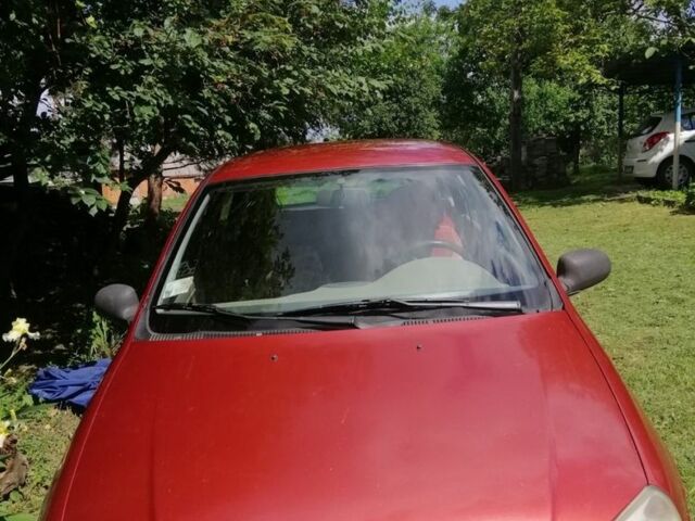 Красный ВАЗ 1119 Калина, объемом двигателя 1.6 л и пробегом 130 тыс. км за 1170 $, фото 1 на Automoto.ua