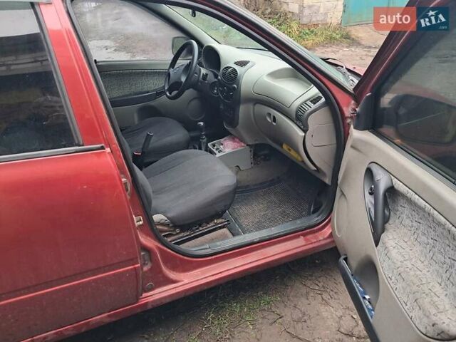 Красный ВАЗ 1119 Калина, объемом двигателя 1.6 л и пробегом 160 тыс. км за 1700 $, фото 2 на Automoto.ua