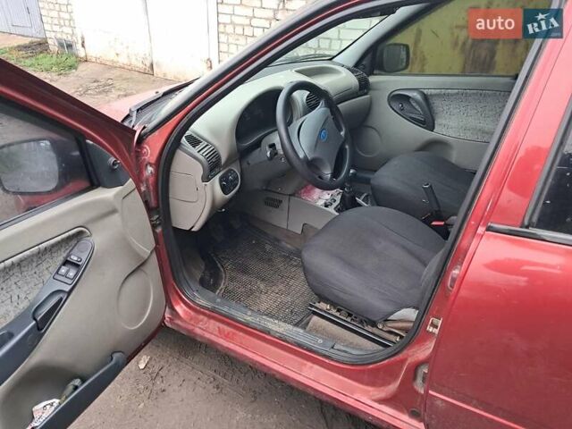 Красный ВАЗ 1119 Калина, объемом двигателя 1.6 л и пробегом 160 тыс. км за 1700 $, фото 6 на Automoto.ua