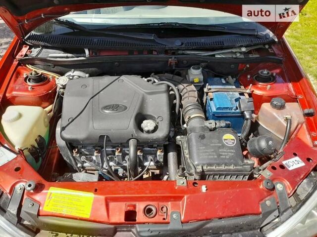 Красный ВАЗ 1119 Калина, объемом двигателя 1.6 л и пробегом 95 тыс. км за 2400 $, фото 11 на Automoto.ua