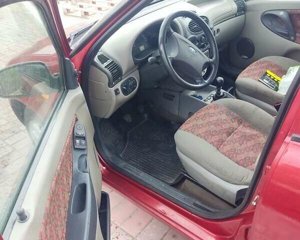 Красный ВАЗ 1119 Калина, объемом двигателя 1.4 л и пробегом 160 тыс. км за 1700 $, фото 2 на Automoto.ua