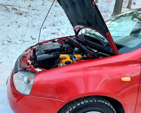 Красный ВАЗ 1119 Калина, объемом двигателя 1.39 л и пробегом 207 тыс. км за 2000 $, фото 48 на Automoto.ua