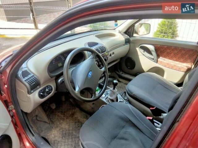 Красный ВАЗ 1119 Калина, объемом двигателя 1.4 л и пробегом 90 тыс. км за 3700 $, фото 3 на Automoto.ua