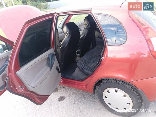 Червоний ВАЗ 1119 Калина, об'ємом двигуна 1.39 л та пробігом 83 тис. км за 2300 $, фото 6 на Automoto.ua
