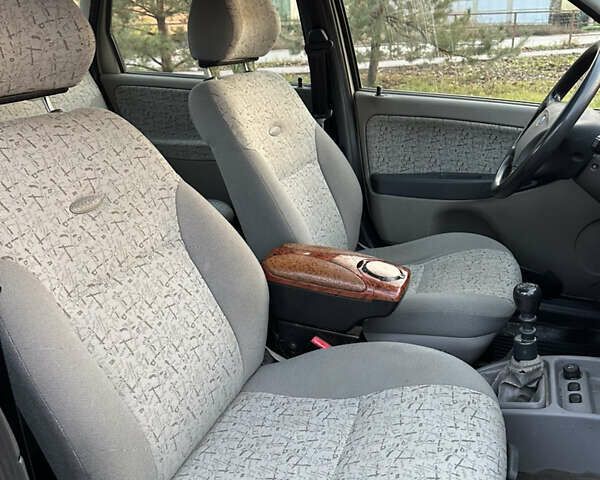 Серый ВАЗ 1119 Калина, объемом двигателя 1.6 л и пробегом 98 тыс. км за 1999 $, фото 21 на Automoto.ua