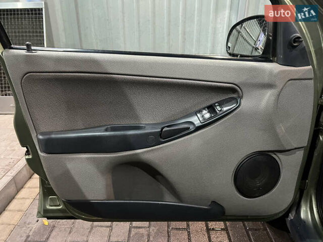 Зелений ВАЗ 1119 Калина, об'ємом двигуна 1.6 л та пробігом 198 тис. км за 2000 $, фото 23 на Automoto.ua