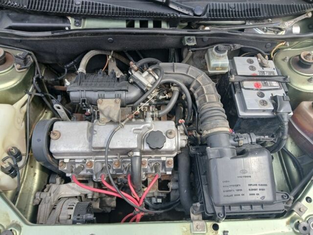 Зелений ВАЗ 1119 Калина, об'ємом двигуна 1.6 л та пробігом 99 тис. км за 2000 $, фото 10 на Automoto.ua