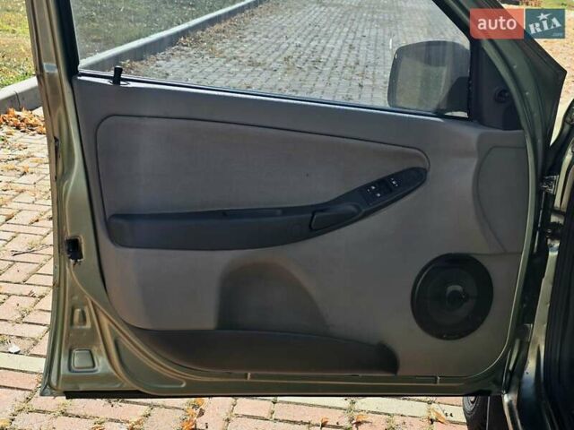 Зелений ВАЗ 1119 Калина, об'ємом двигуна 1.4 л та пробігом 89 тис. км за 2100 $, фото 12 на Automoto.ua