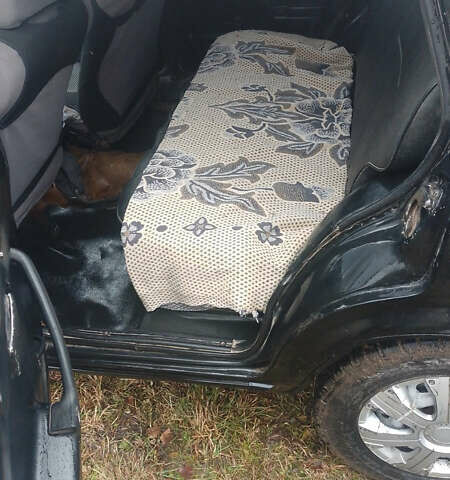 Черный ВАЗ 2104, объемом двигателя 1.5 л и пробегом 280 тыс. км за 900 $, фото 2 на Automoto.ua