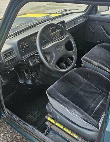 Зеленый ВАЗ 2104, объемом двигателя 1.5 л и пробегом 135 тыс. км за 1000 $, фото 4 на Automoto.ua