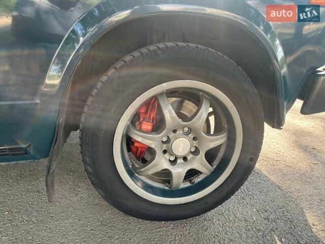 Зеленый ВАЗ 2104, объемом двигателя 1.5 л и пробегом 1 тыс. км за 1800 $, фото 6 на Automoto.ua
