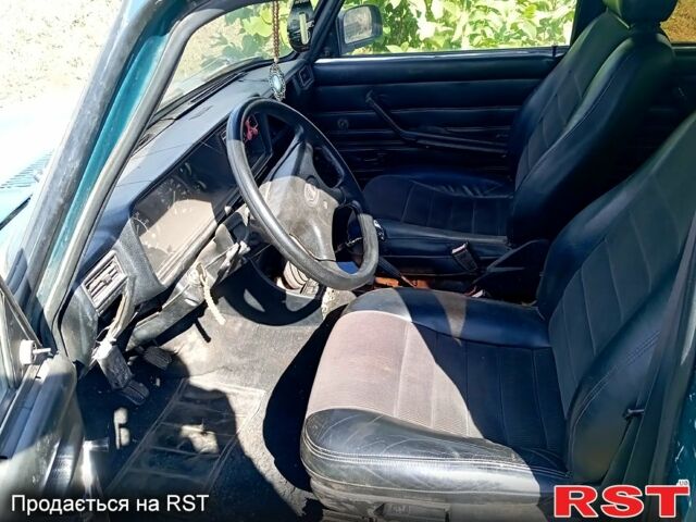 Зеленый ВАЗ 2104, объемом двигателя 1.5 л и пробегом 210 тыс. км за 1100 $, фото 1 на Automoto.ua