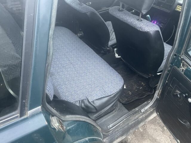 Зеленый ВАЗ 2104, объемом двигателя 1.5 л и пробегом 170 тыс. км за 1500 $, фото 6 на Automoto.ua