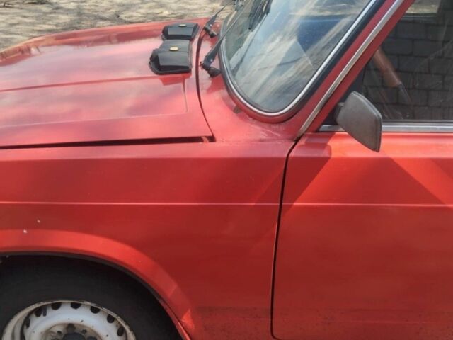 Красный ВАЗ 2105, объемом двигателя 1 л и пробегом 100 тыс. км за 592 $, фото 6 на Automoto.ua