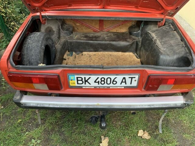 Красный ВАЗ 2105, объемом двигателя 5 л и пробегом 200 тыс. км за 550 $, фото 4 на Automoto.ua