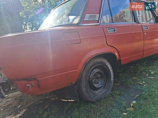 Красный ВАЗ 2107, объемом двигателя 1.5 л и пробегом 300 тыс. км за 500 $, фото 1 на Automoto.ua