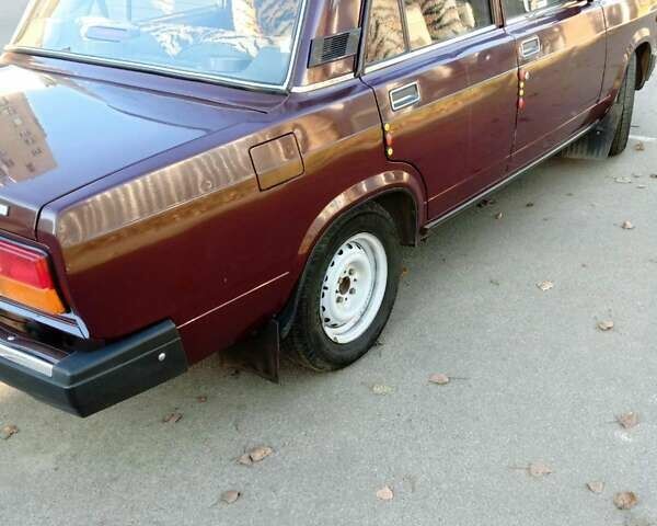 Червоний ВАЗ 2107, об'ємом двигуна 1.45 л та пробігом 76 тис. км за 1999 $, фото 2 на Automoto.ua