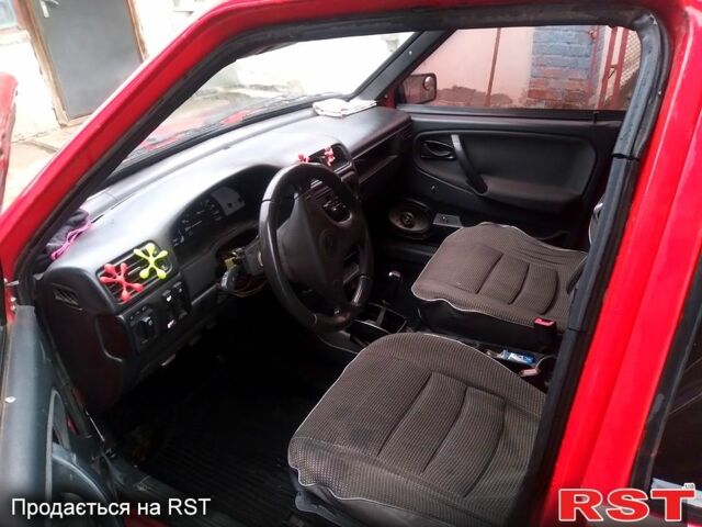 Красный ВАЗ 2109, объемом двигателя 1.3 л и пробегом 205 тыс. км за 1010 $, фото 6 на Automoto.ua