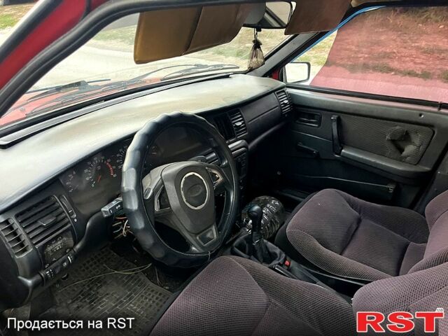 Красный ВАЗ 2109, объемом двигателя 1.5 л и пробегом 200 тыс. км за 999 $, фото 4 на Automoto.ua