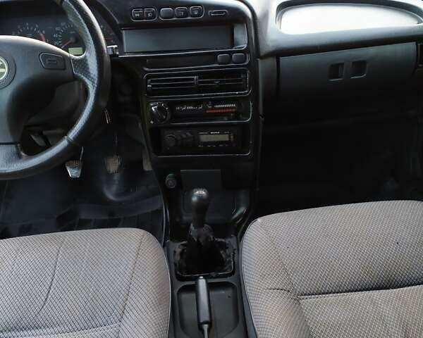 Красный ВАЗ 2109, объемом двигателя 1.6 л и пробегом 169 тыс. км за 1350 $, фото 4 на Automoto.ua