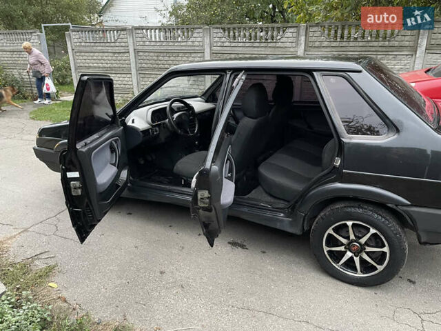 Чорний ВАЗ 21099, об'ємом двигуна 1.6 л та пробігом 140 тис. км за 1300 $, фото 6 на Automoto.ua