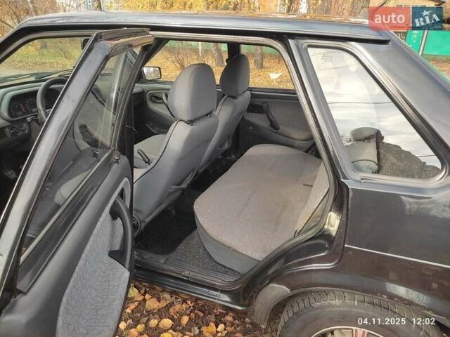 Черный ВАЗ 21099, объемом двигателя 1.6 л и пробегом 148 тыс. км за 2000 $, фото 11 на Automoto.ua