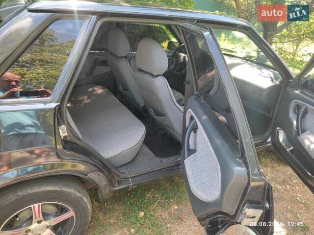 Чорний ВАЗ 21099, об'ємом двигуна 1.6 л та пробігом 142 тис. км за 1600 $, фото 6 на Automoto.ua