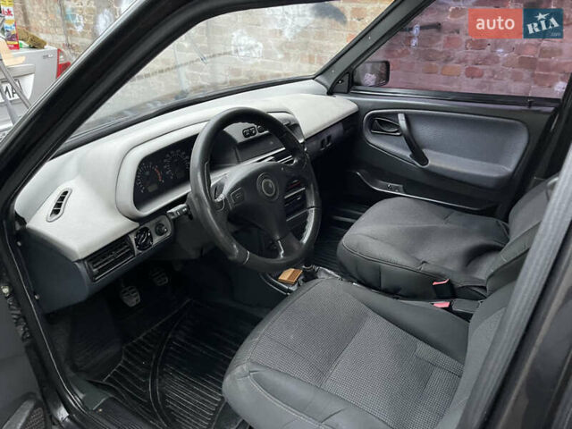 Чорний ВАЗ 21099, об'ємом двигуна 1.6 л та пробігом 140 тис. км за 1300 $, фото 9 на Automoto.ua