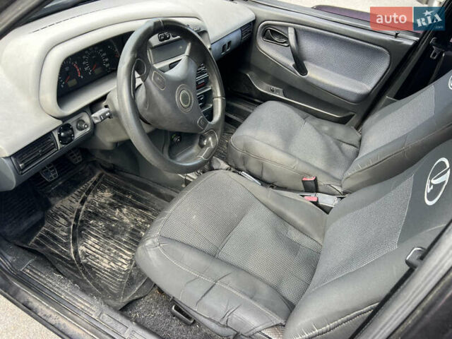 Чорний ВАЗ 21099, об'ємом двигуна 1.6 л та пробігом 200 тис. км за 1100 $, фото 8 на Automoto.ua