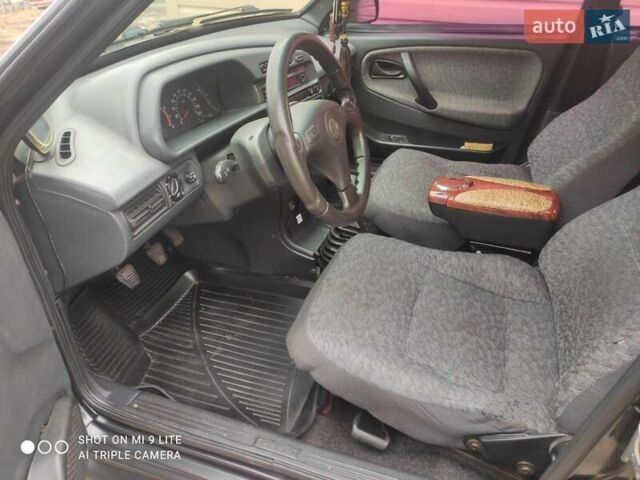 Черный ВАЗ 21099, объемом двигателя 1.6 л и пробегом 251 тыс. км за 2650 $, фото 2 на Automoto.ua