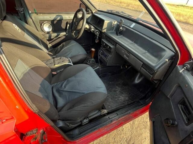 Красный ВАЗ 21099, объемом двигателя 1.3 л и пробегом 55 тыс. км за 1100 $, фото 10 на Automoto.ua