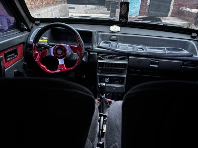 Красный ВАЗ 21099, объемом двигателя 1 л и пробегом 9 тыс. км за 1250 $, фото 5 на Automoto.ua