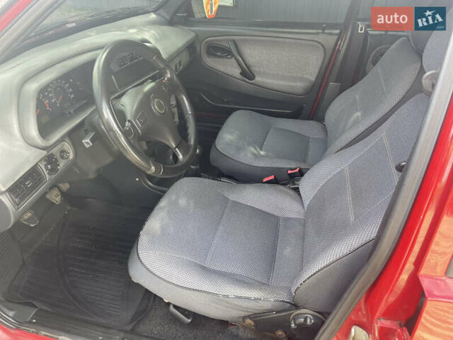 Красный ВАЗ 21099, объемом двигателя 1.6 л и пробегом 144 тыс. км за 1850 $, фото 11 на Automoto.ua
