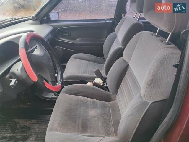 ВАЗ 21099 2007 в Каменке на Automoto.ua Красный ВАЗ 21099, объемом двигателя 1.6 л и пробегом 215 тыс. км за 2100 $, фото 9 на Automoto.ua