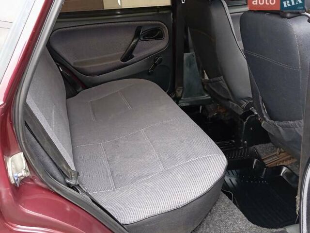 Красный ВАЗ 21099, объемом двигателя 1.6 л и пробегом 267 тыс. км за 2150 $, фото 35 на Automoto.ua