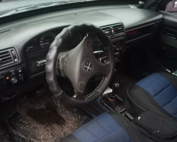 Серый ВАЗ 21099, объемом двигателя 1.5 л и пробегом 150 тыс. км за 2000 $, фото 4 на Automoto.ua