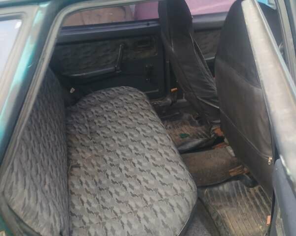 Зеленый ВАЗ 21099, объемом двигателя 1.5 л и пробегом 230 тыс. км за 1100 $, фото 2 на Automoto.ua